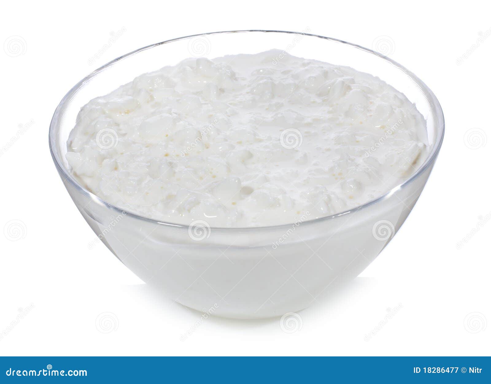 Fresh Cottage Cheese In A Transparent Bowl With Raisins. In The