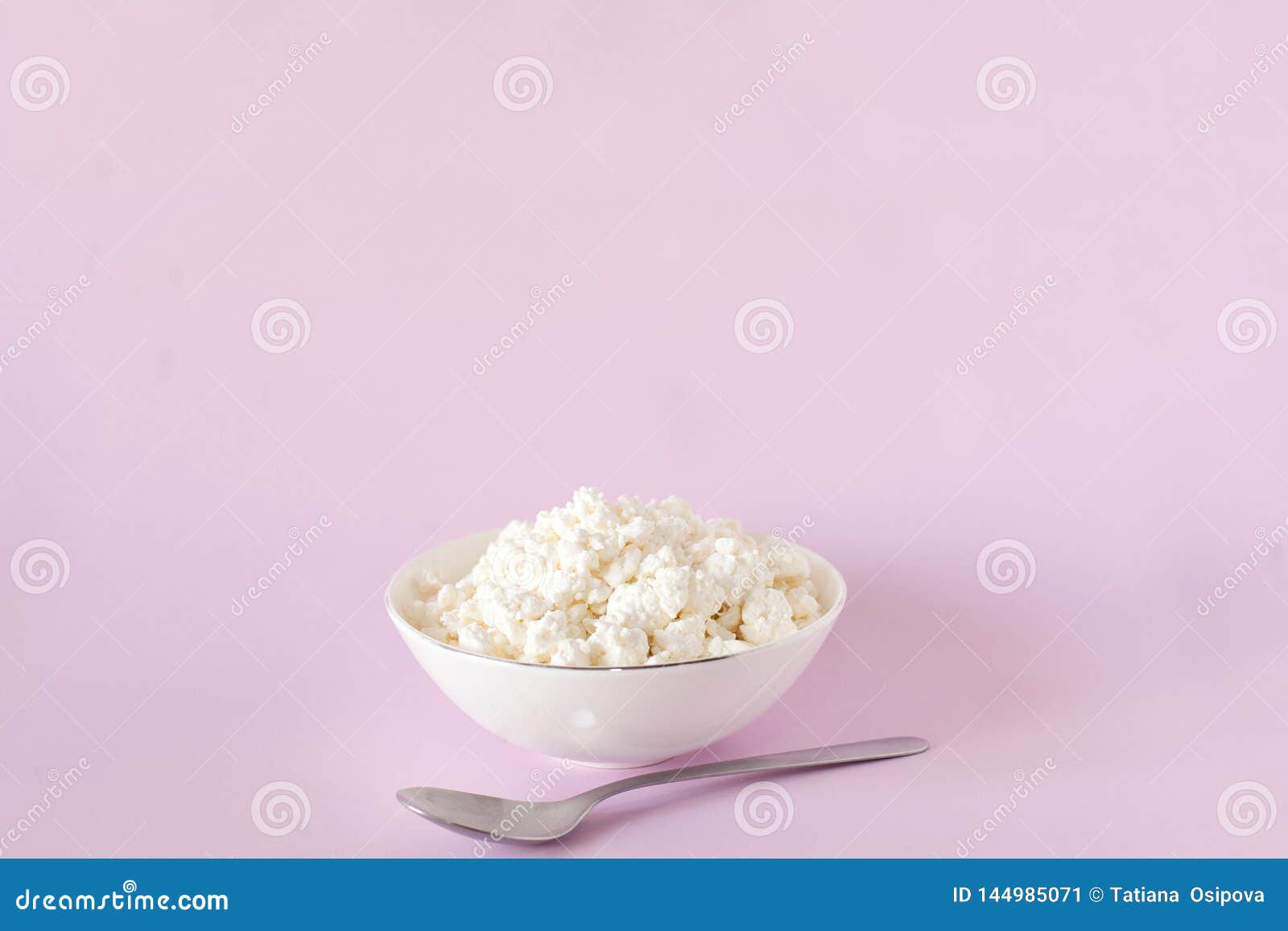 Fresh Cottage Cheese For Breakfast In A White Bowl And A Spoon In