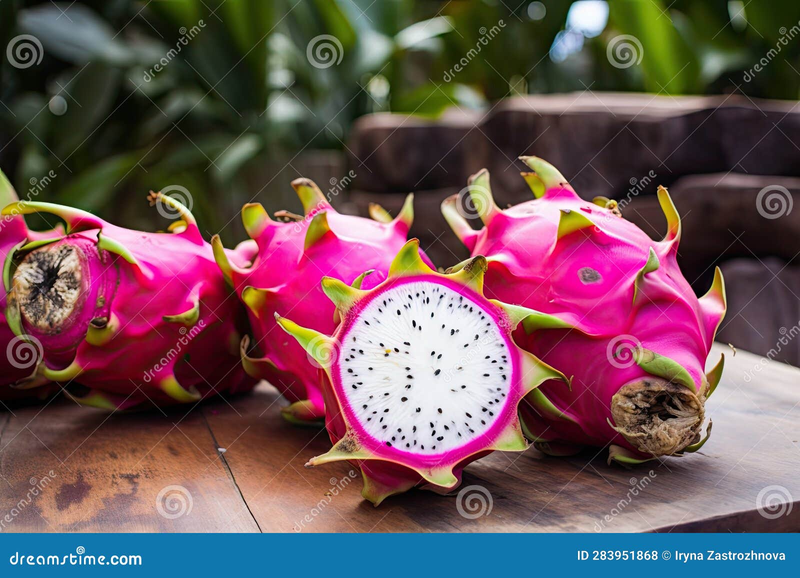 Fresh Dragon Fruit Whole and Cut on the Table, Pitaya Stock