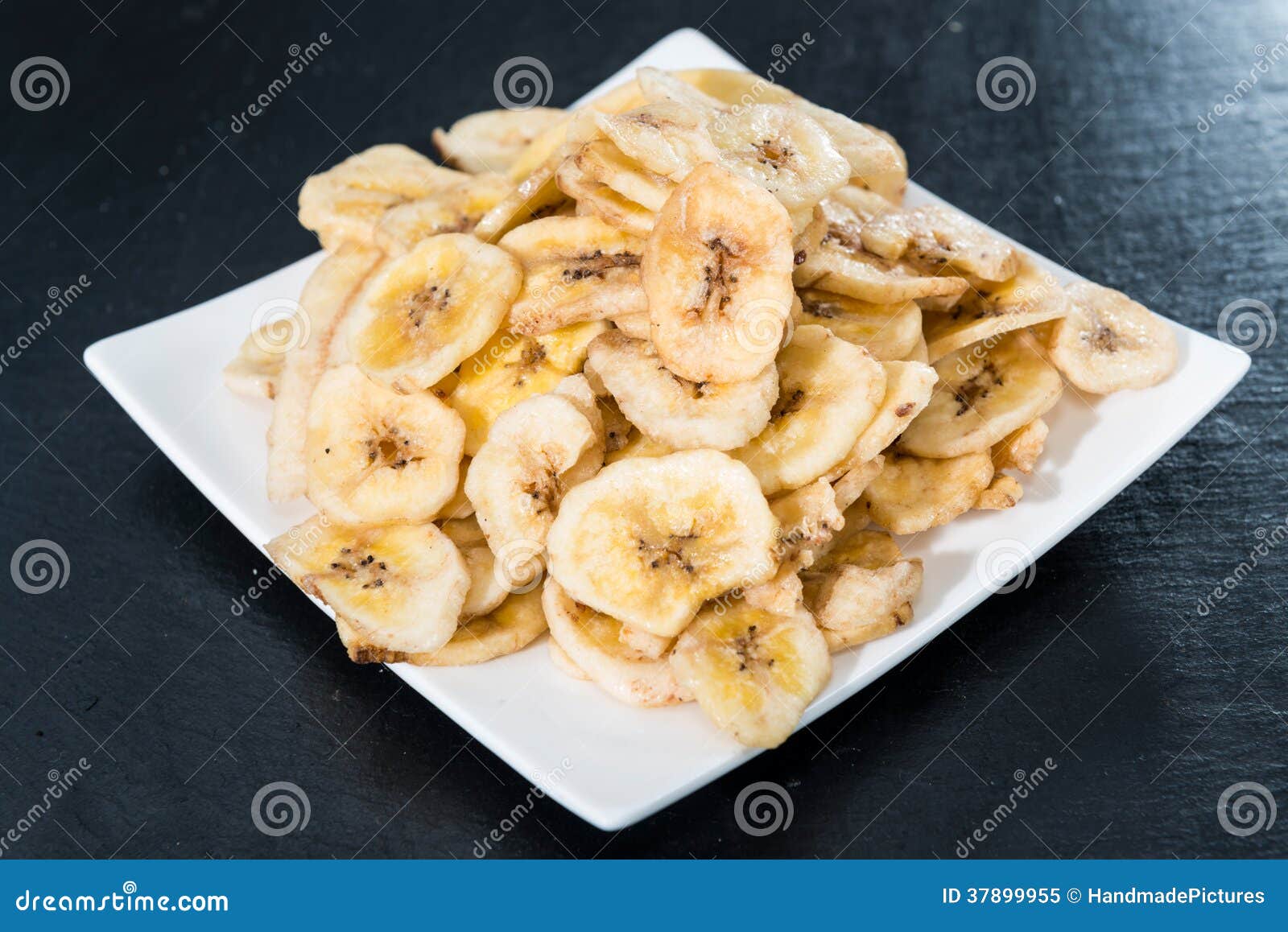 Fresh dried Banana Chips stock image. Image of slice 37899955