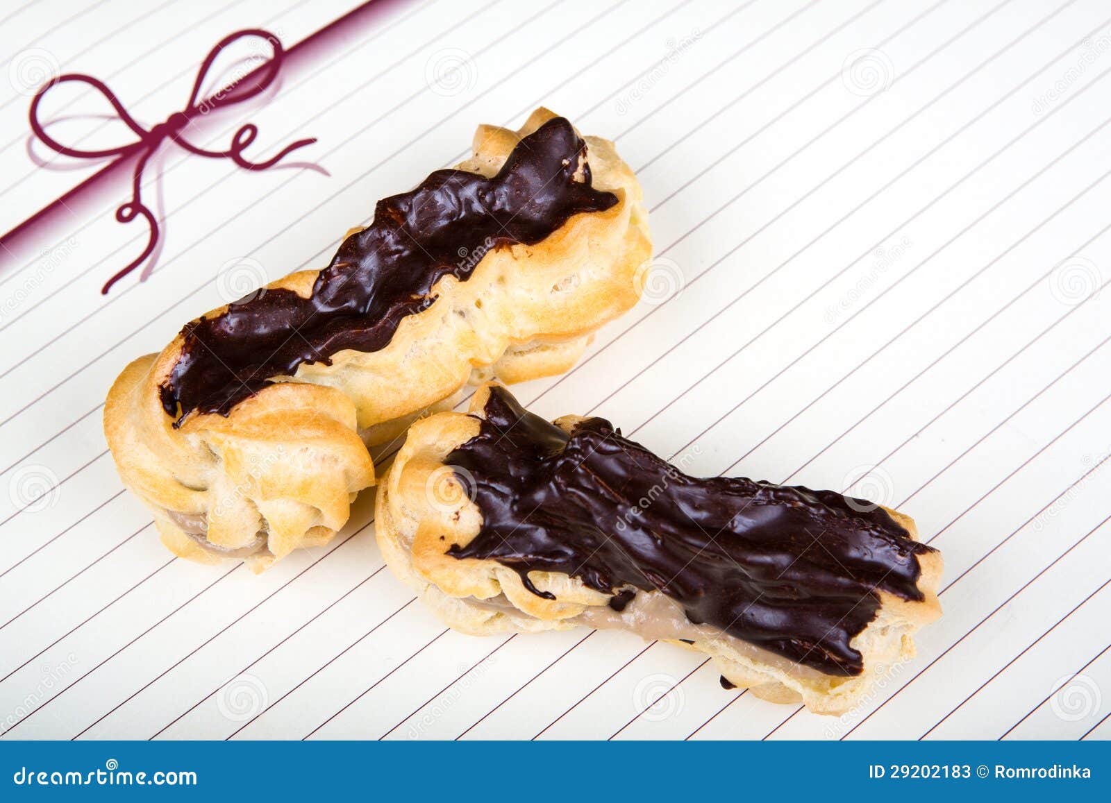 Fresh Eclairs with Coffee Cream Inside and Chocolate Stock Image