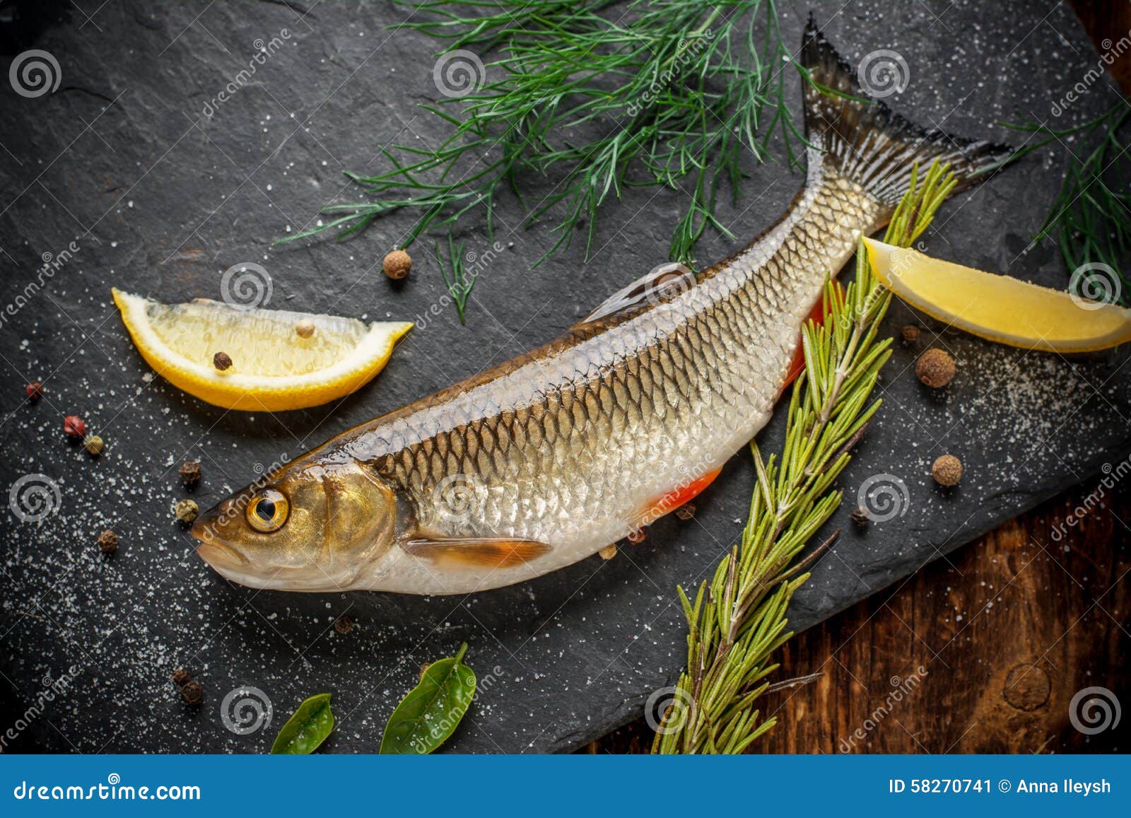 Fresh Fish Ide on a Black Stone Slab Surrounded by Stock Image - Image of  dace, angling: 58270741