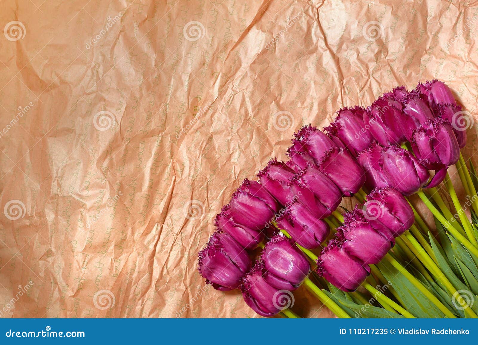 fresh flower composition, bouquet purple tulips on craft paper background. valentine, women`s, 8 march, birthday, mother