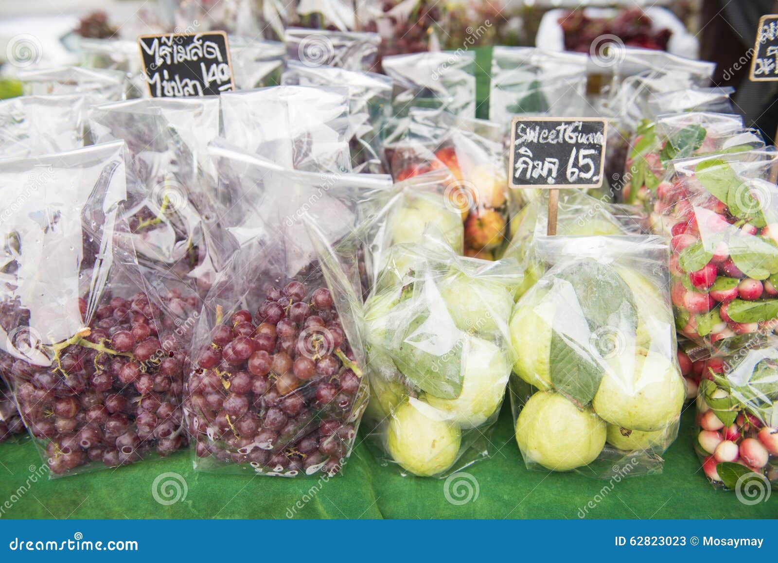 Fresh Fruit in Plastic Bags on the Market Stock Image Image of