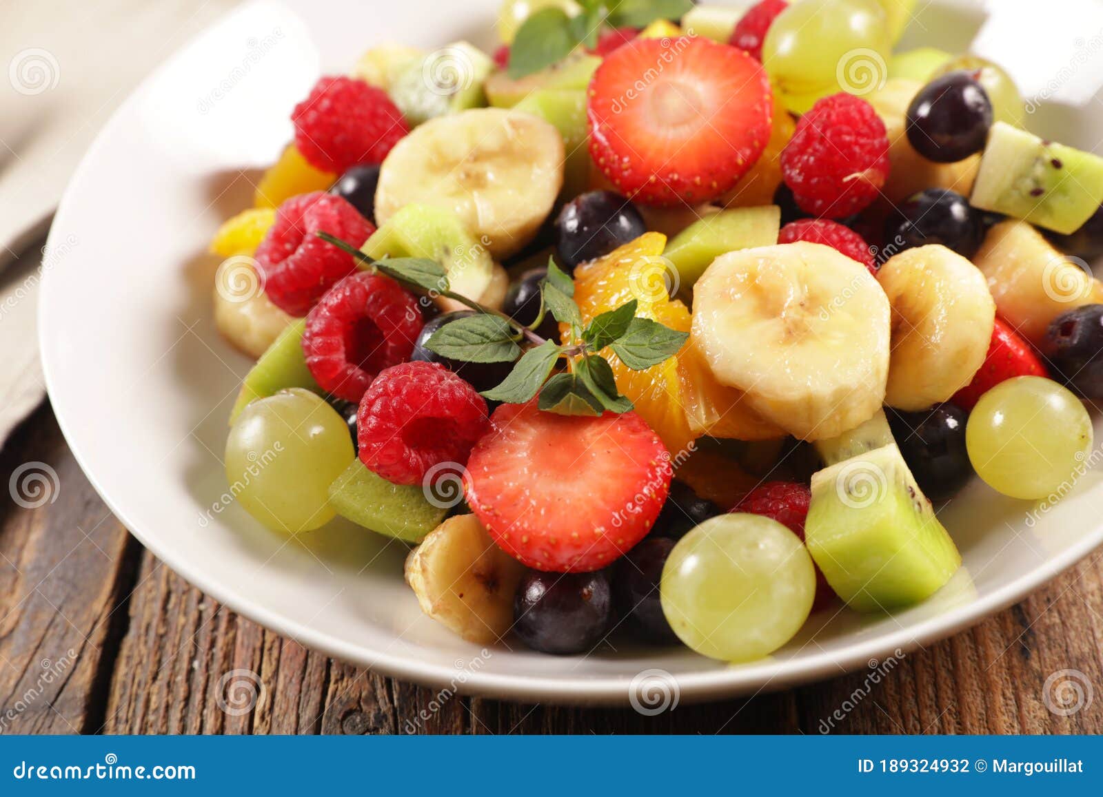 Fruit salad in bowl stock photo. Image of nutrition 189324932