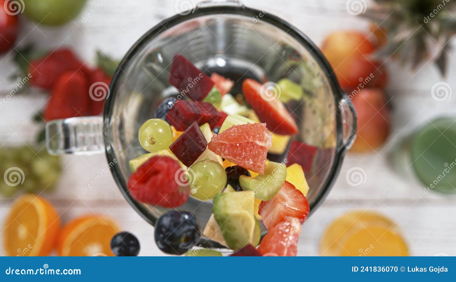 Fresh Fruit and Vegetables Smoothie Blended in Blender, Top View. Stock