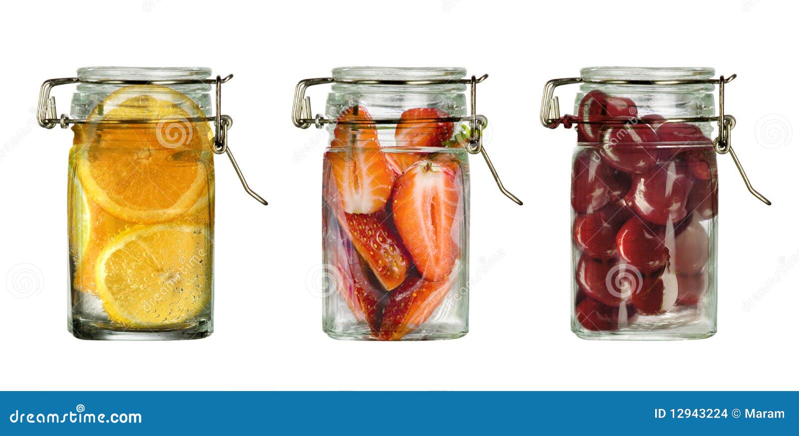 Fresh fruits in bottles stock photo. Image of orange 12943224