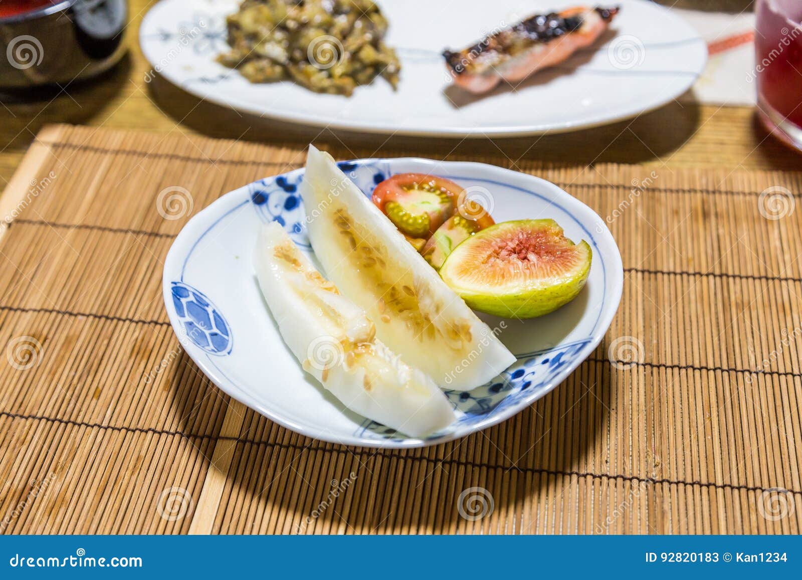 Fresh Fruits after Breakfast Honeydew Melon, Fig and Tomato. Stock