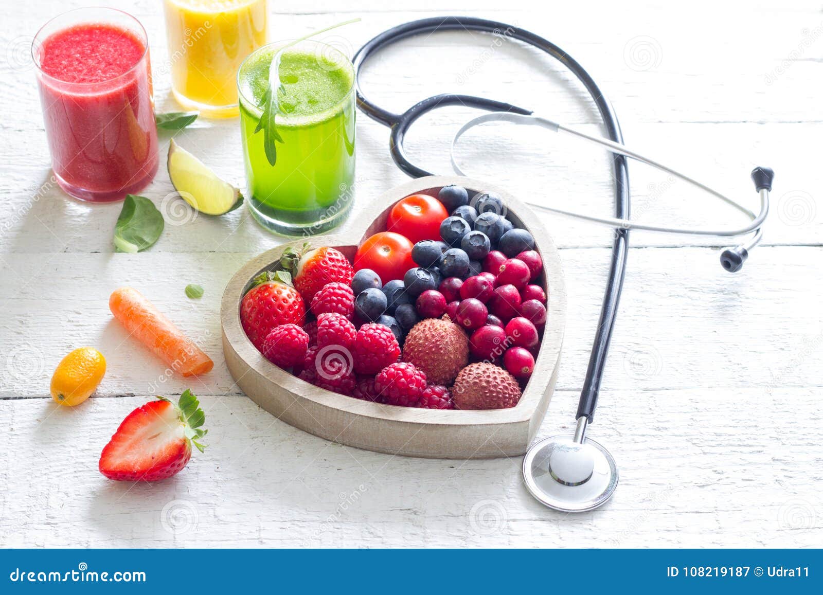 fresh fruits vegetables and heart  with stethoscope health diet concept