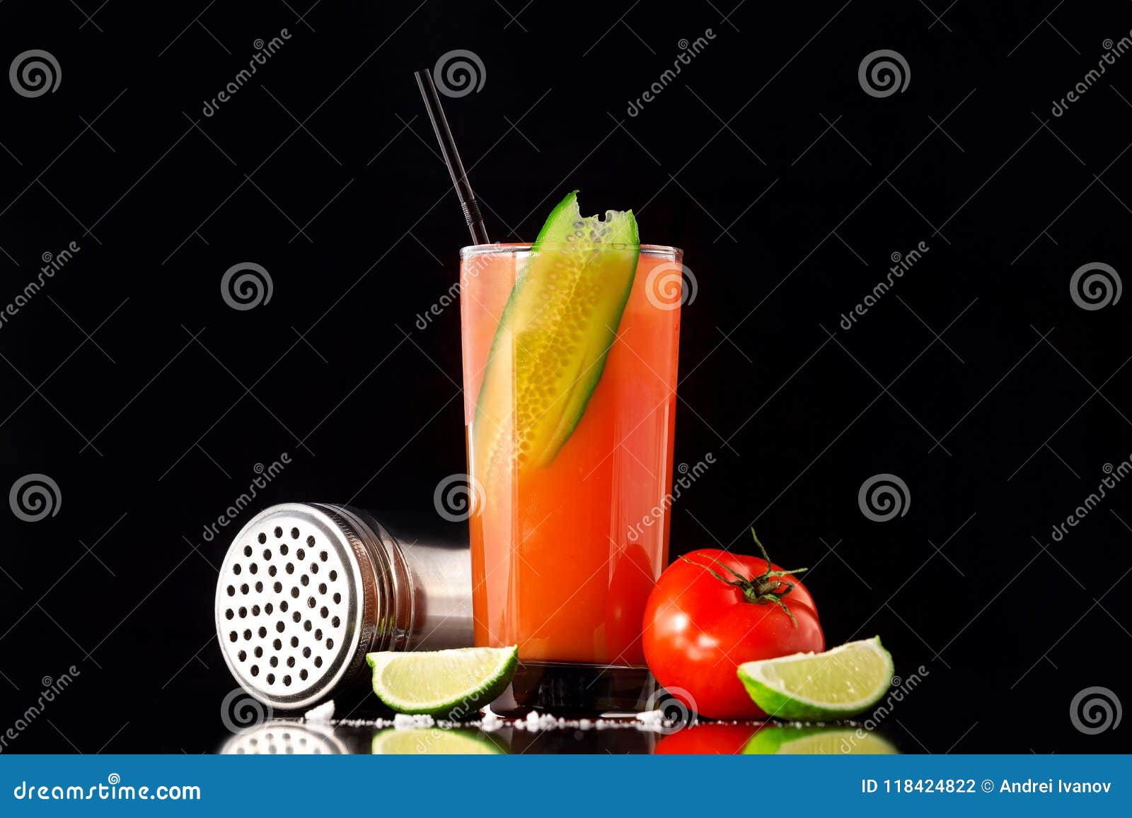 fresh glass of bloody mary cocktail decorated with lime