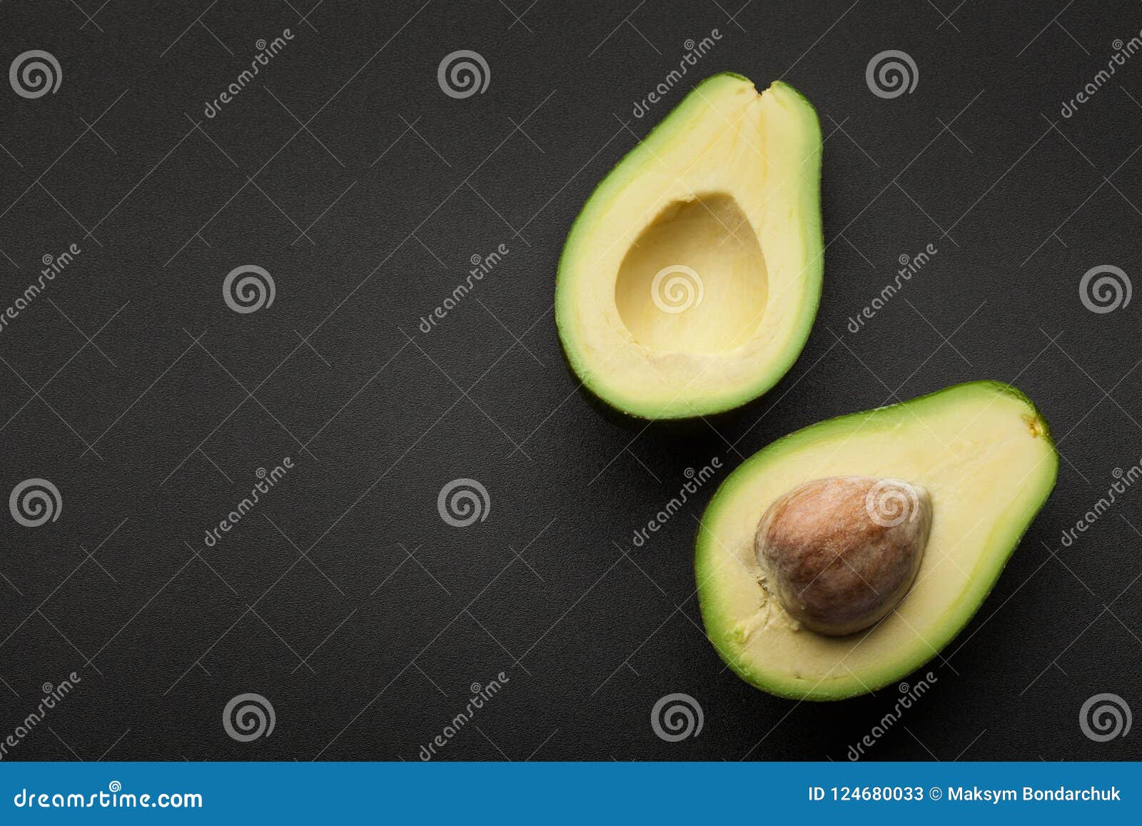 fresh green avocado  on dark background