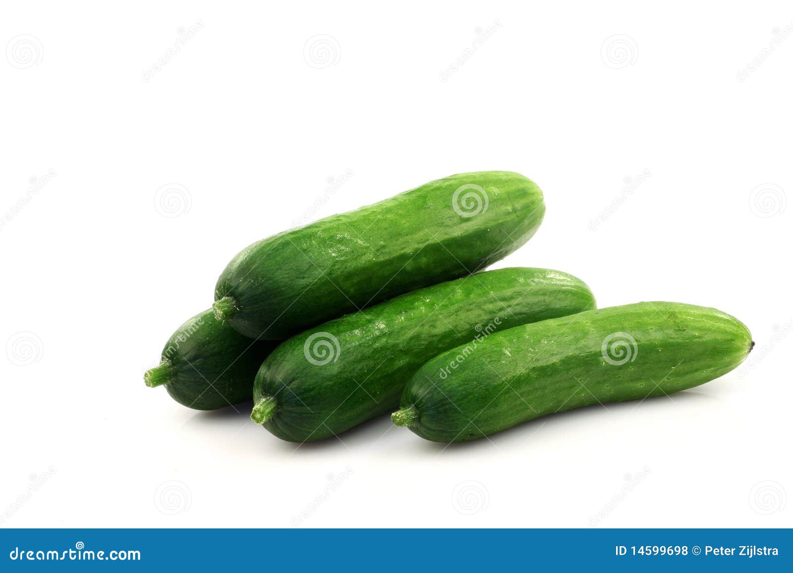 Fresh green baby cucumbers stock photo. Image of bunch 14599698