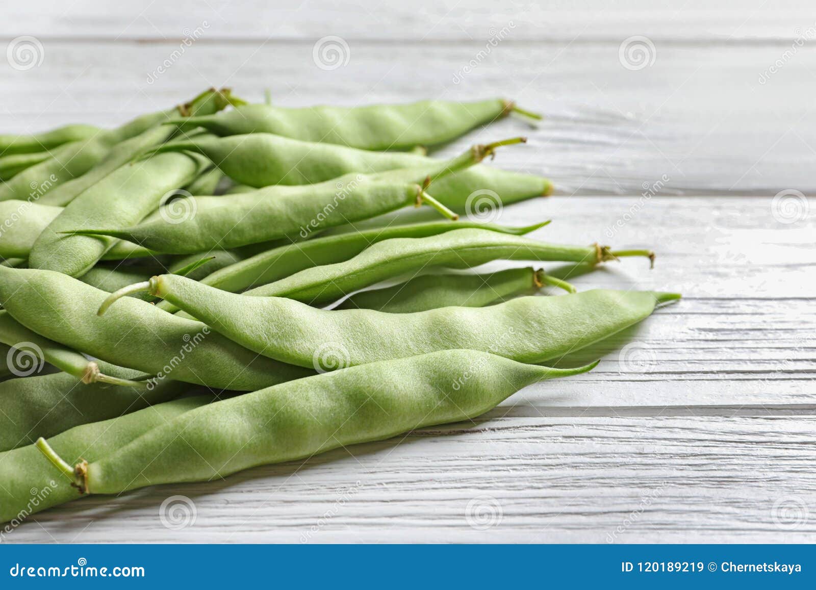 Fresh green beans on table stock image. Image of background - 120189219