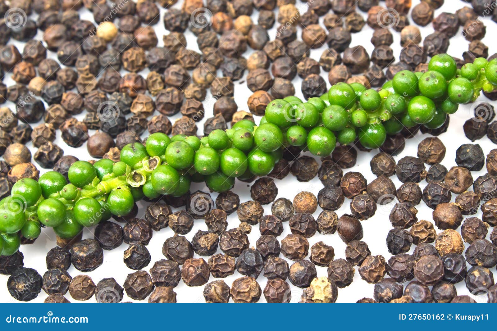 Fresh Green Peper on Heap of Black Pepper Stock Photo Image of
