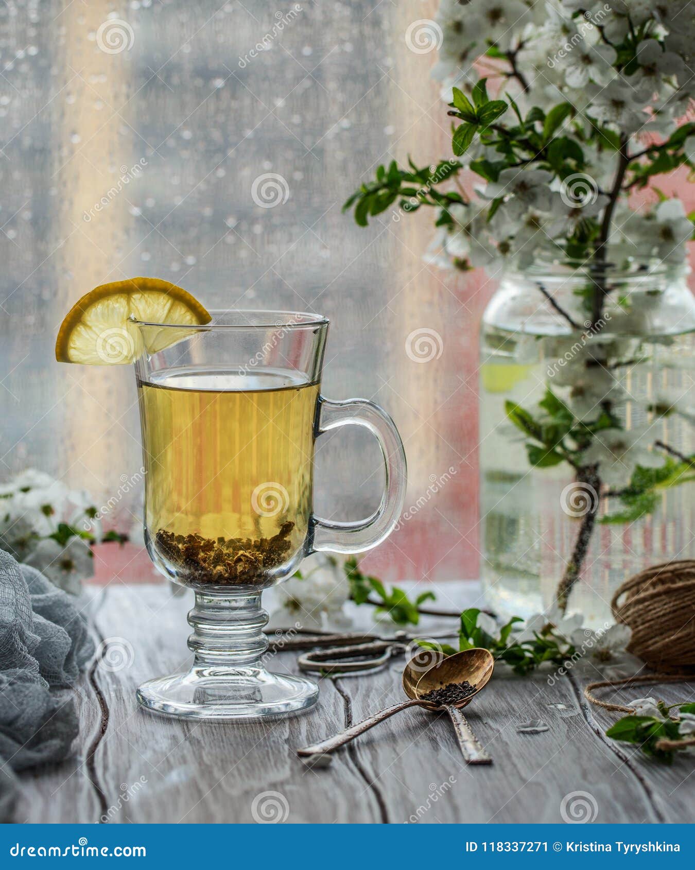 Fresh Green Tea. Tea Cup with Green Tea Leaf on the Wooden Table Stock