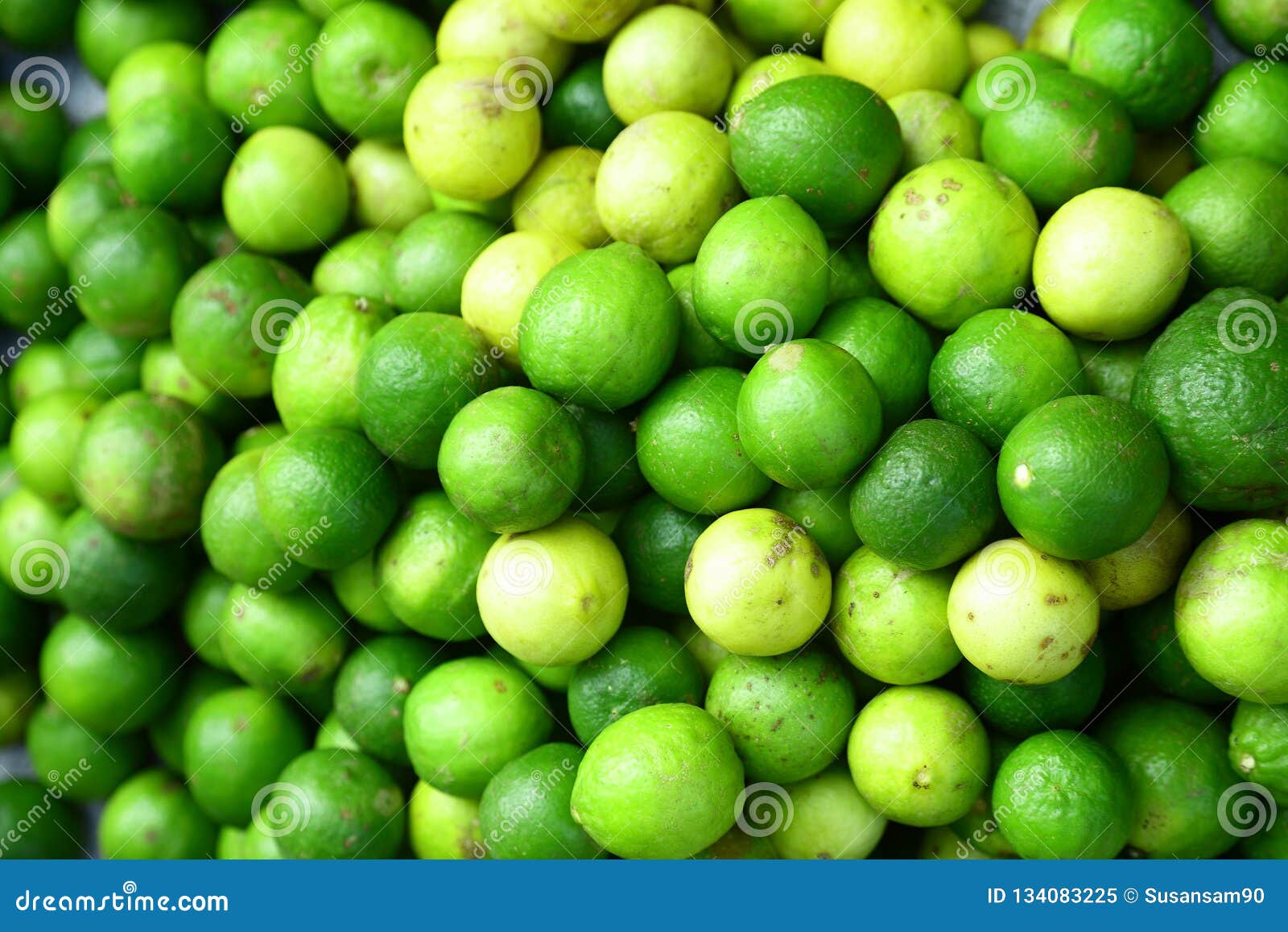 fresh green and yellow raw lemon background.