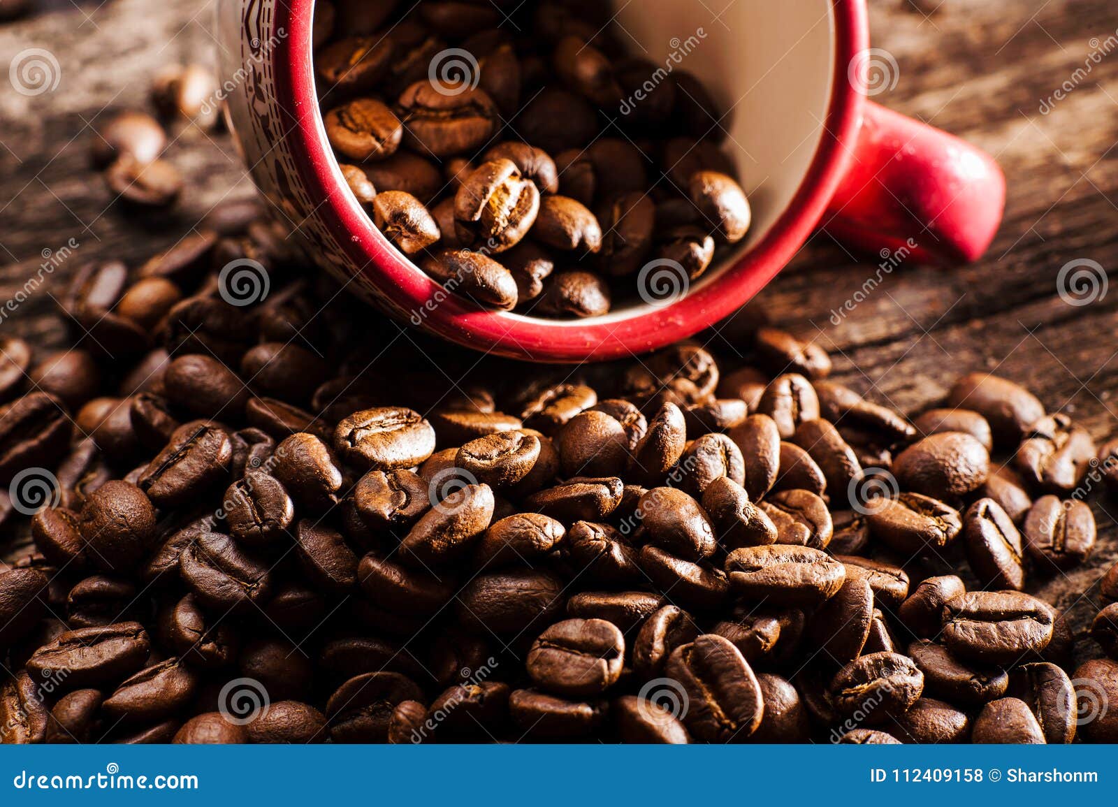Freshground coffee beans stock photo. Image of granule 112409158