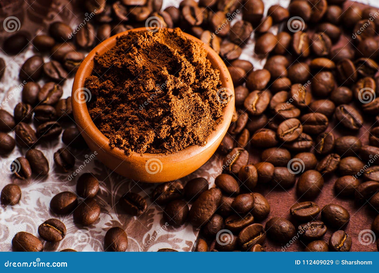 Freshground coffee beans stock image. Image of energy 112409029