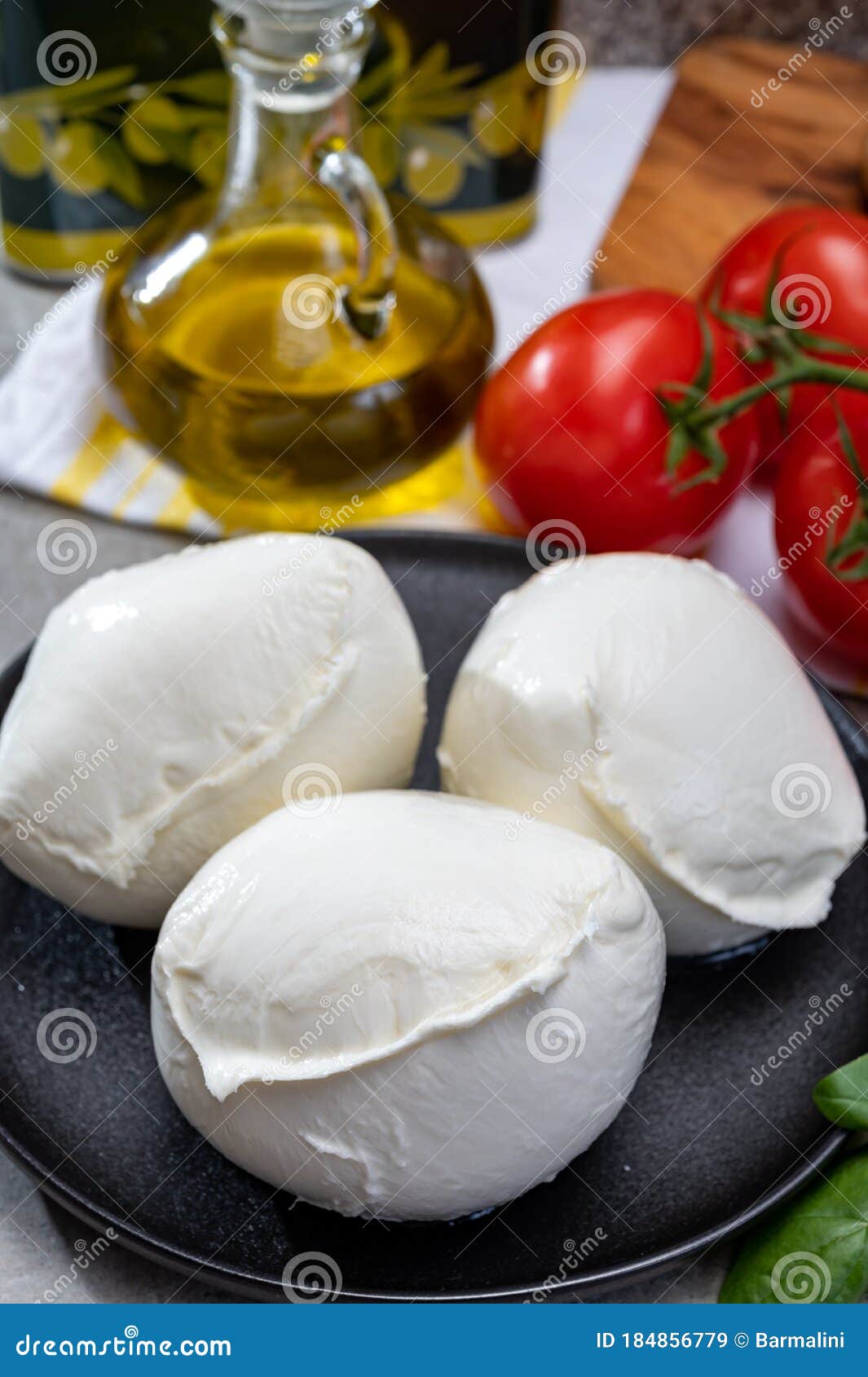 Fresh Handmade Soft Italian Cheese From Campania, White Balls Of Buffalo  Mozzarella Cheese Made From Cow Milk Ready To Eat Stock Image - Image of  hand, appetizer: 184856779