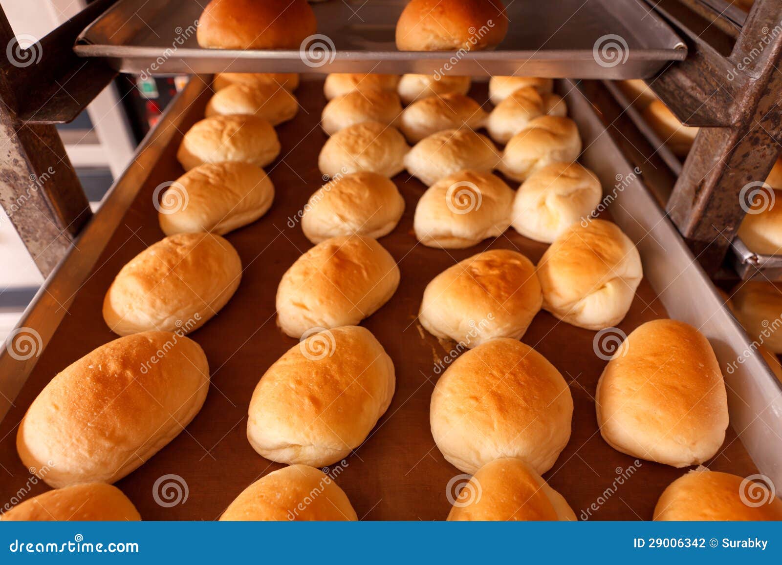 Fresh hot bread in trey stock photo. Image of homemade 29006342