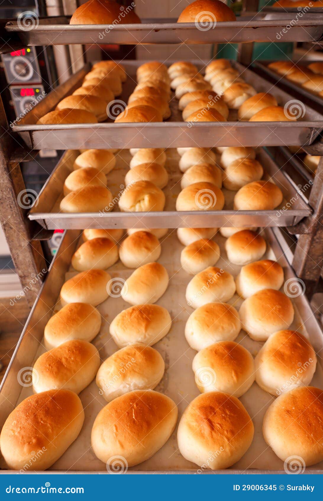 Fresh hot bread in trey stock image. Image of rows, wheat 29006345