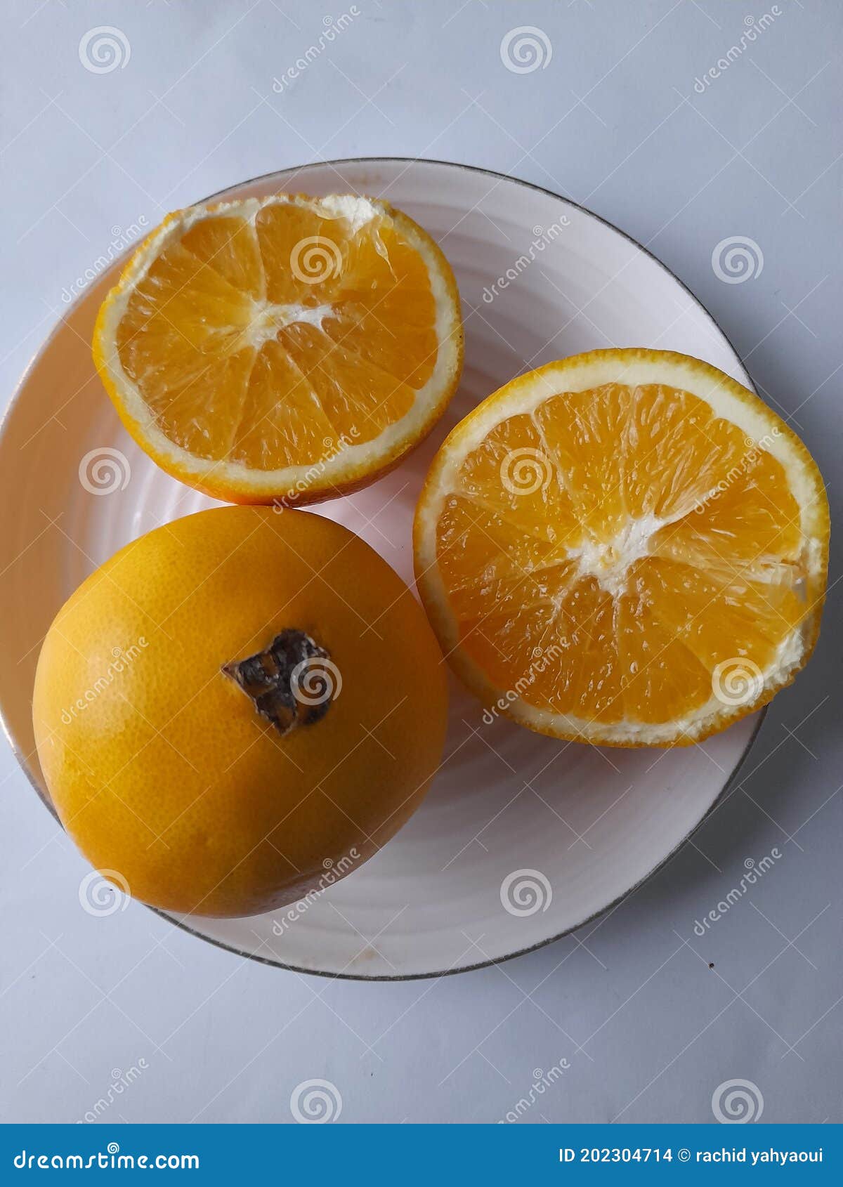 Fresh juicy navel oranges stock photo. Image of food 202304714