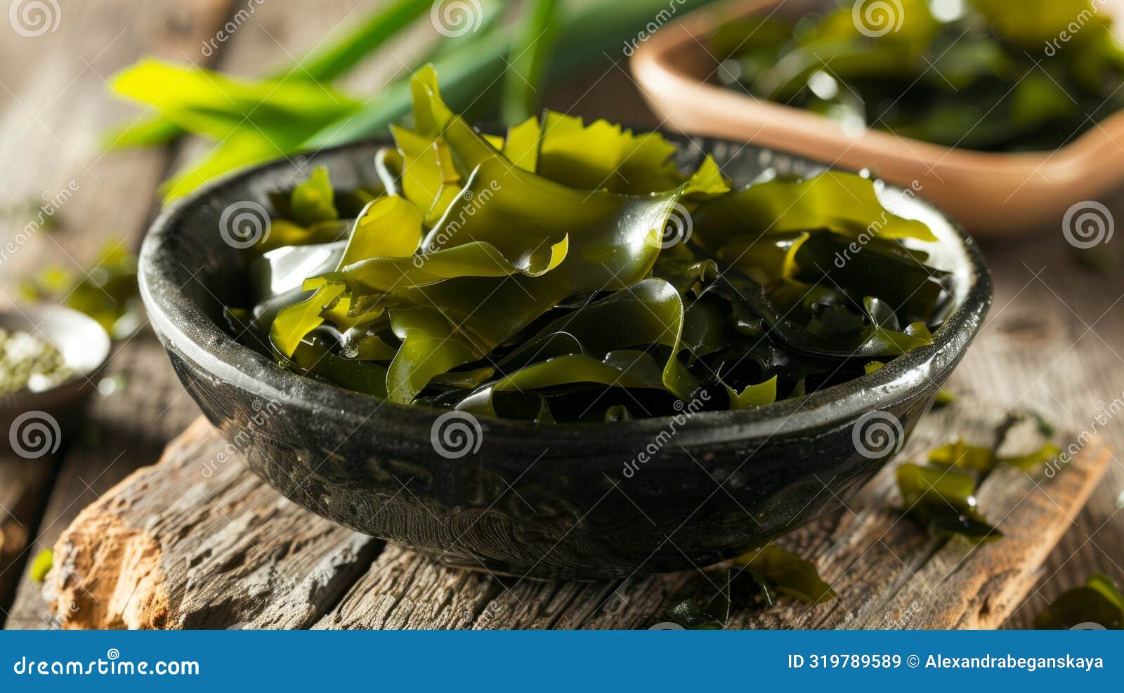 fresh kombu seaweed in a rustic bowl on a wooden table