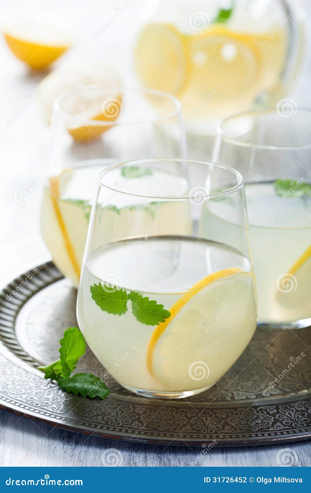 Fresh lemonade in glasses stock photo. Image of glass 31726452