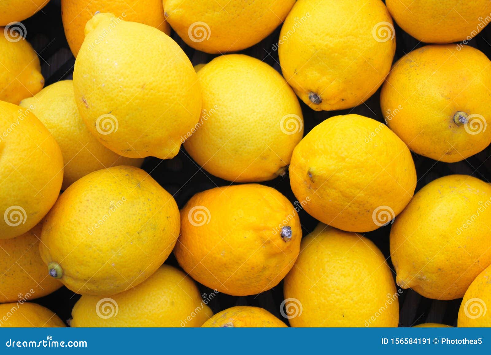 Fresh lemons in the market stock image. Image of organic 156584191