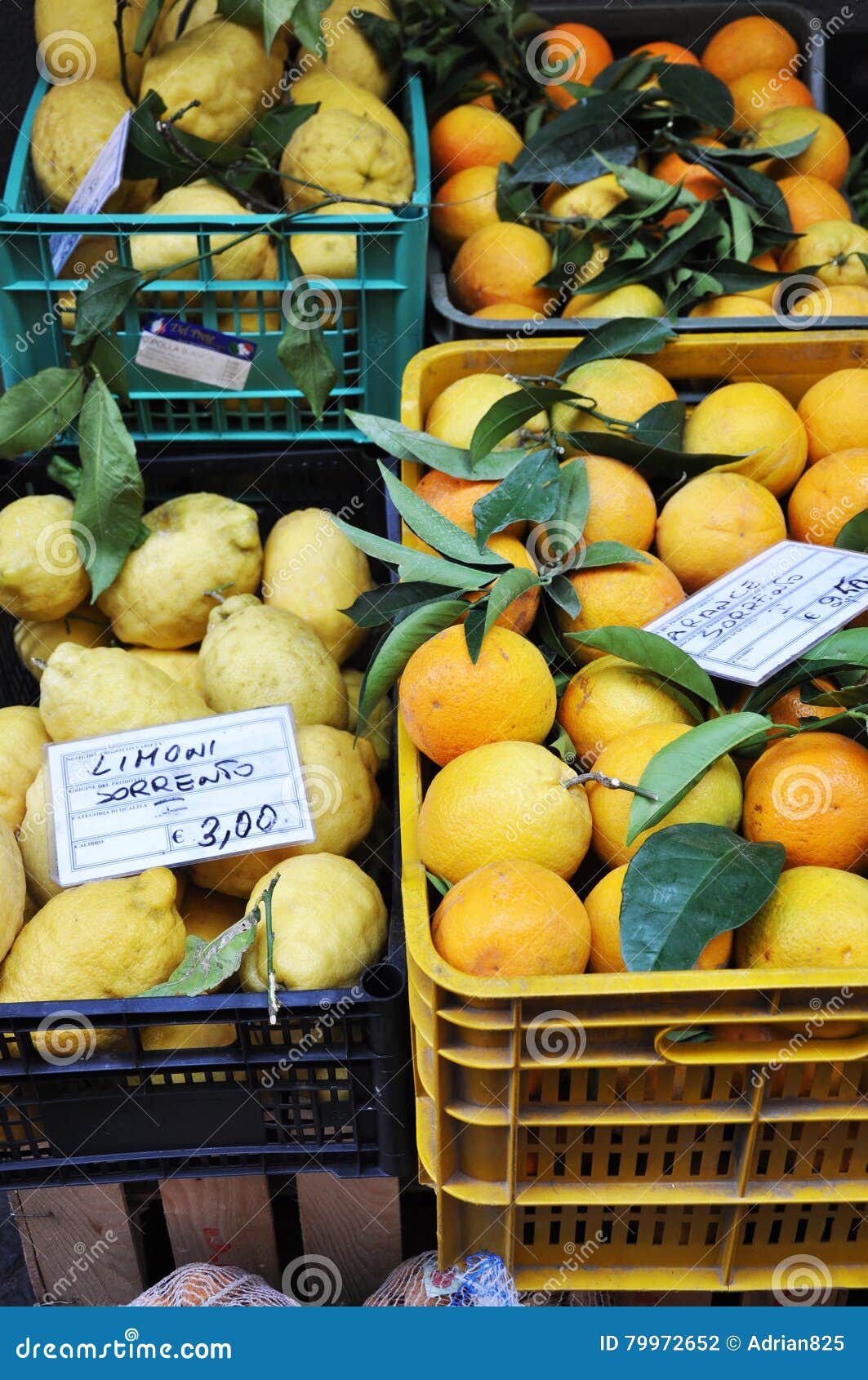 fresh lemons, oranges and other fruits and vegetables on a street market in sorrento, amalfi coast in italy