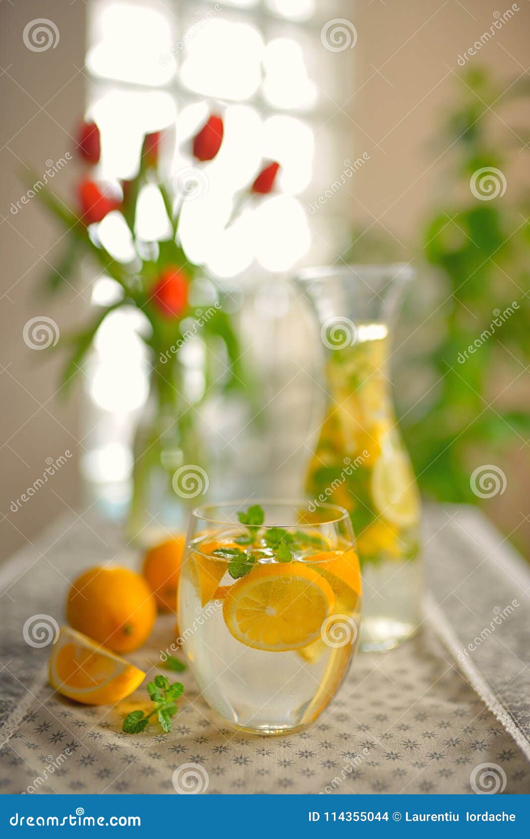 fresh limes and lemonade on table