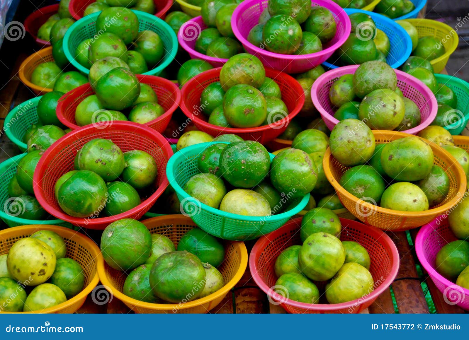 Fresh limes in market stock photo. Image of basket, color 17543772