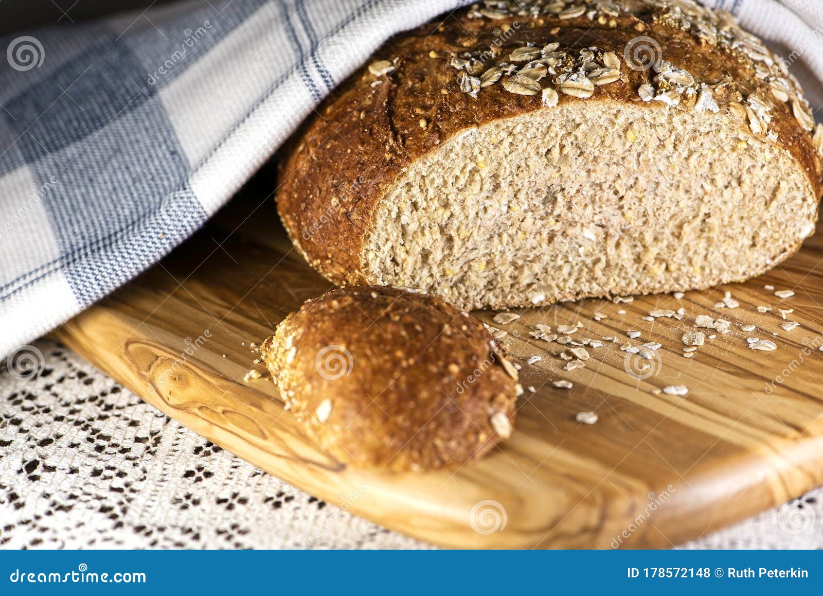 Fresh Loaf of Multi Grain Bread on a Cutting Board Stock Photo Image