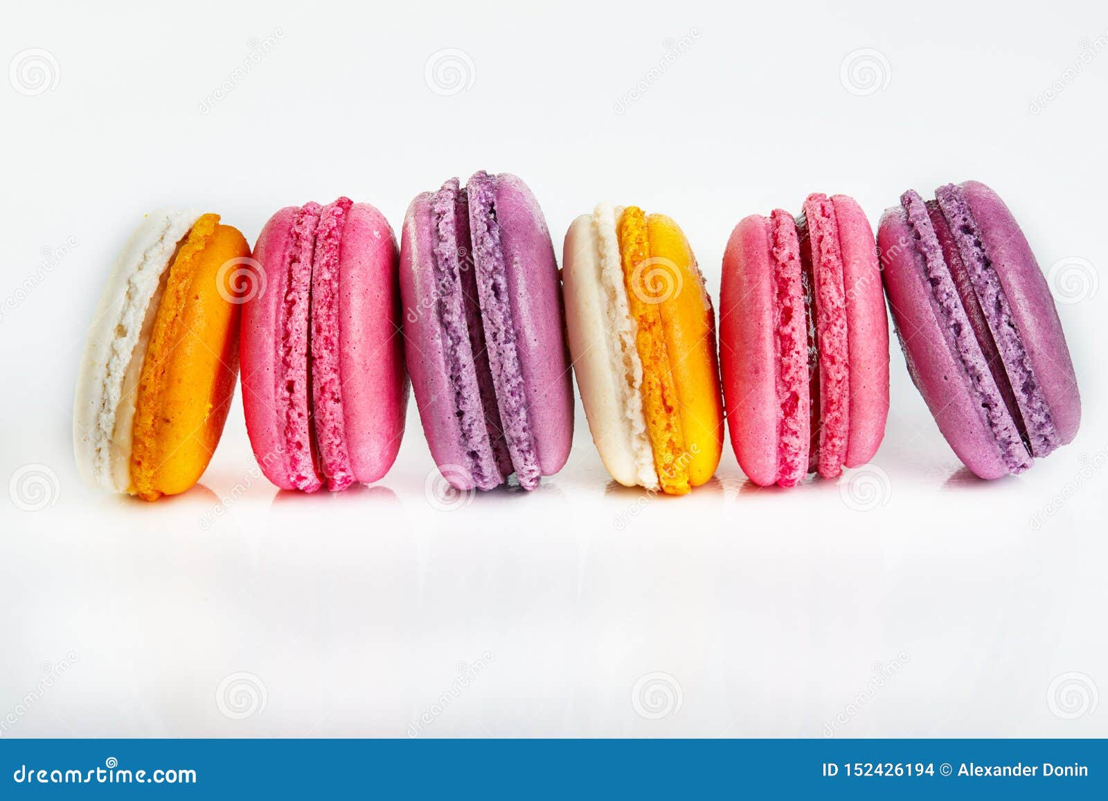 Fresh Macarons of Different Colors and Flavors Isolated on White Stock ...