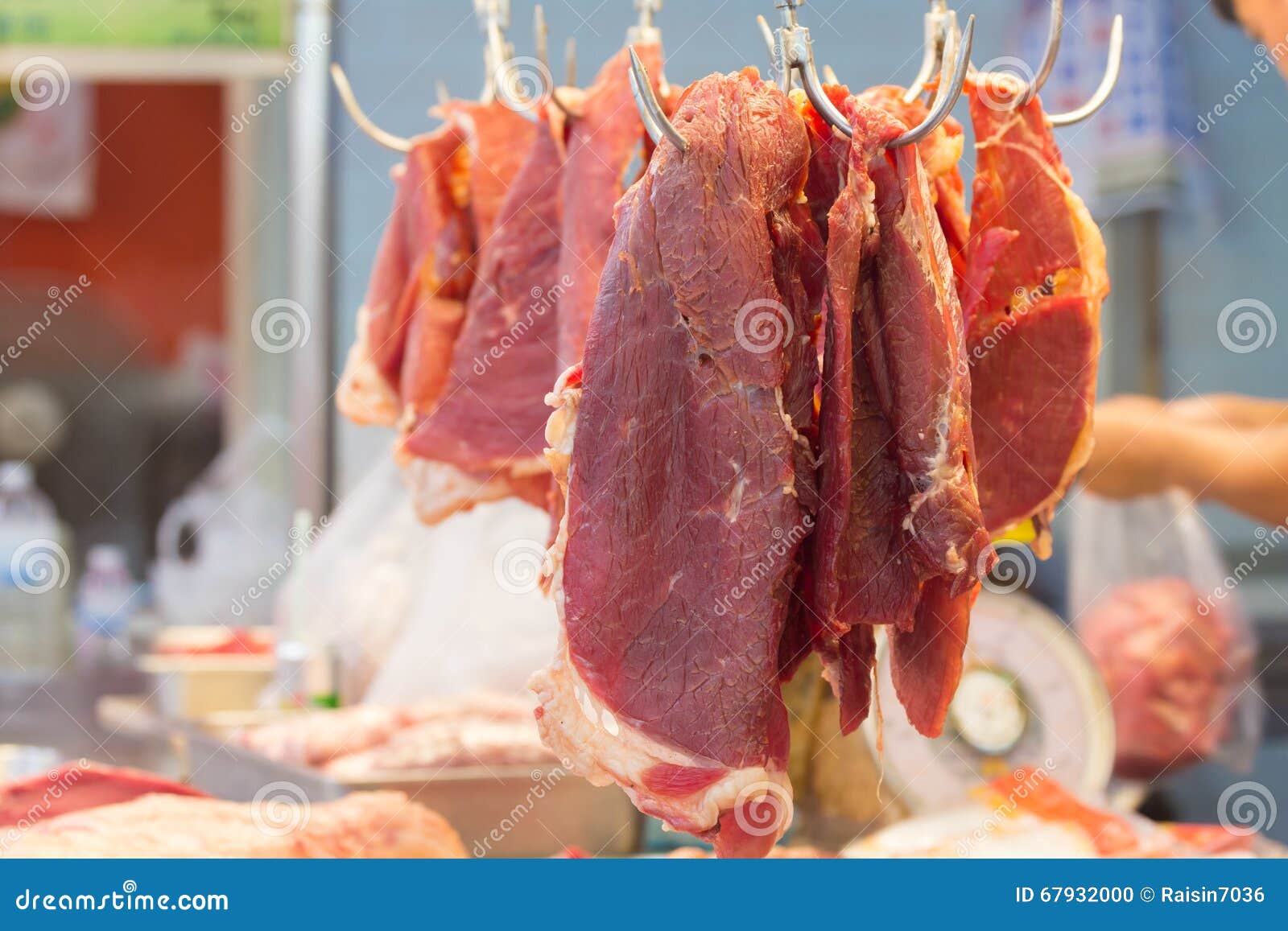 Fresh Meat Hang on Spike in Asain Market. Stock Photo - Image of loin,  roast: 67932000