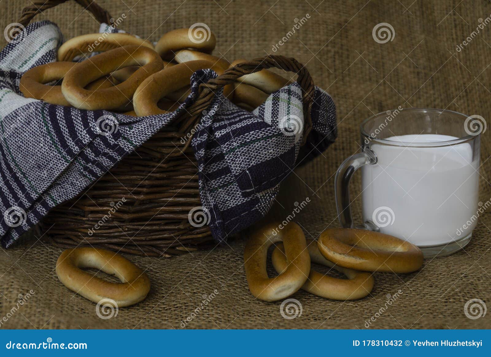 Fresh Milk in a Mug and Bagels in a Basket Stock Photo - Image of ...