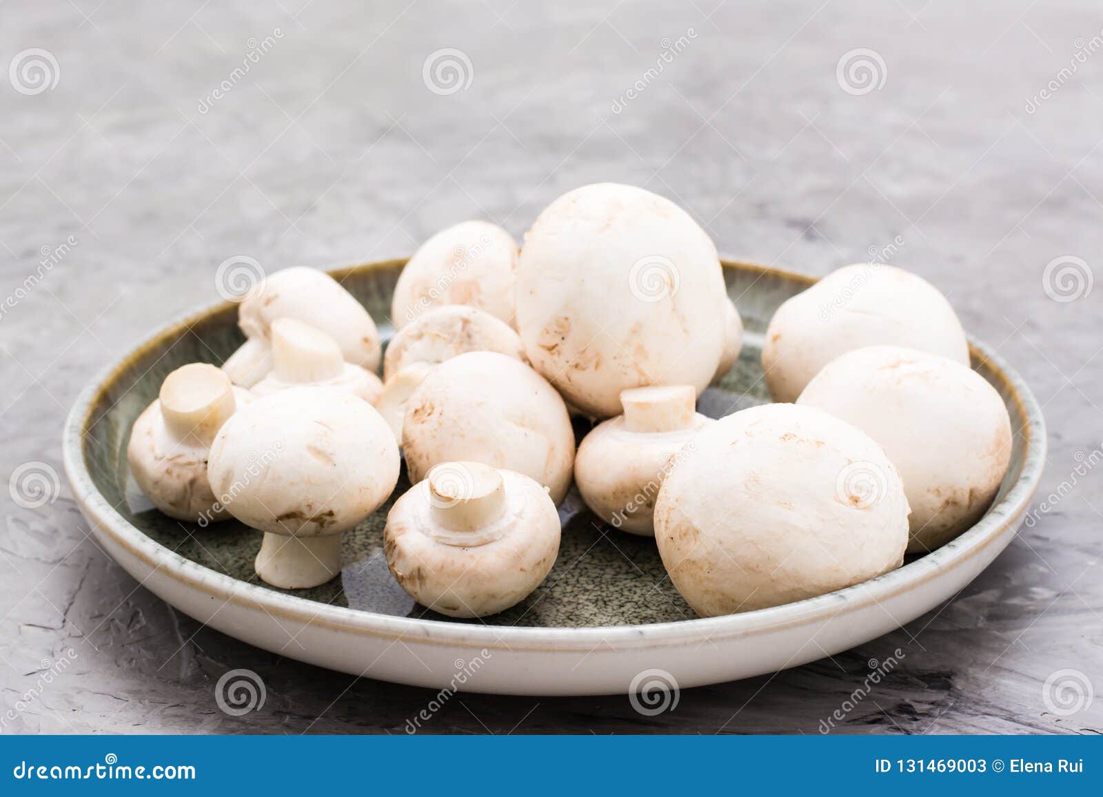 Fresh mushrooms in a plate stock image. Image of diet 131469003