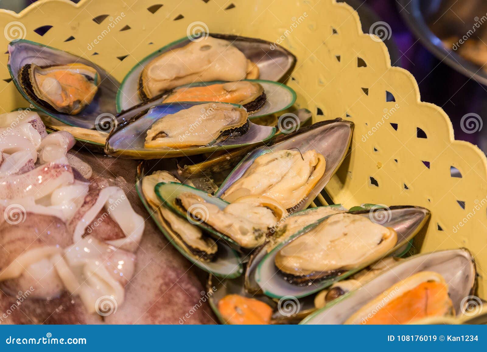 Fresh mussels in basket stock image. Image of seafood 108176019