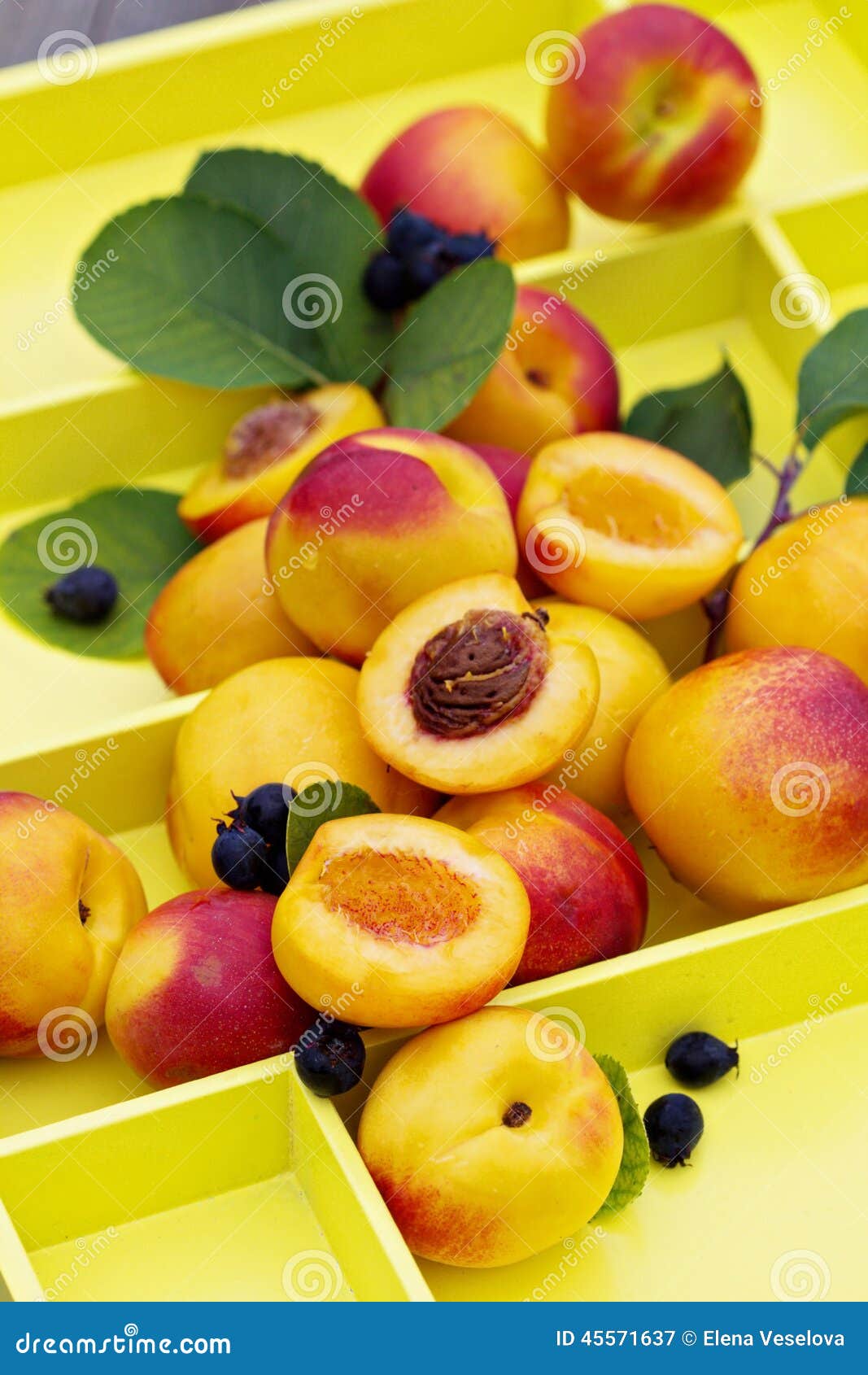 Fresh nectarines on a tray stock image. Image of diet 45571637