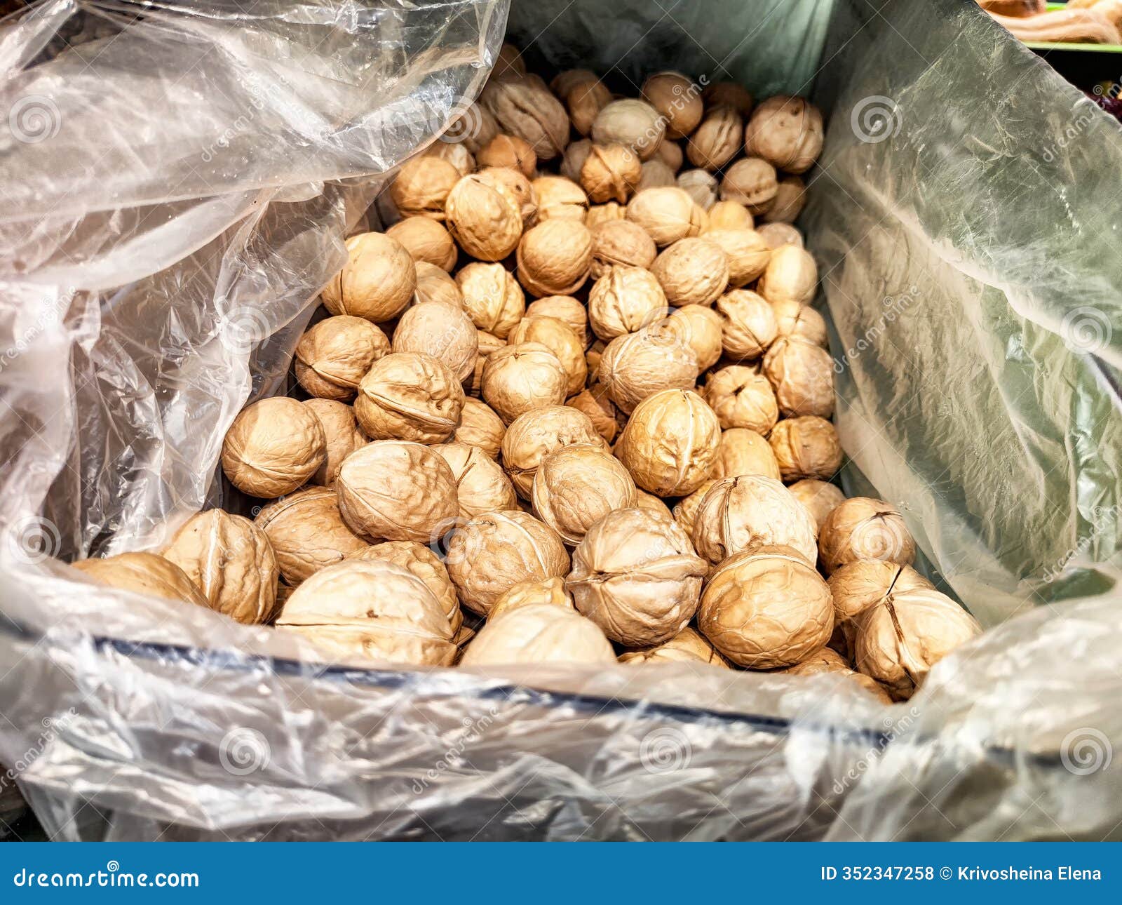 fresh nuts displayed in a market for customers to purchase and enjoy as a healthy snack