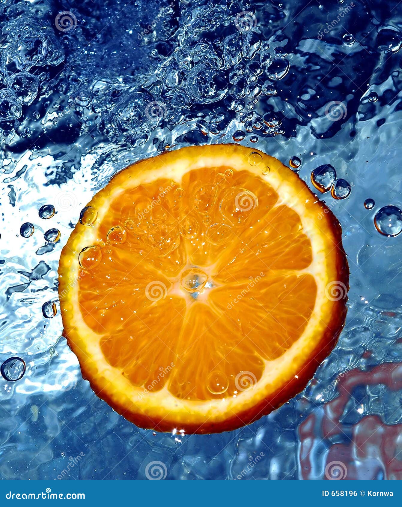 Fresh orange in water stock photo. Image of water, drops 658196