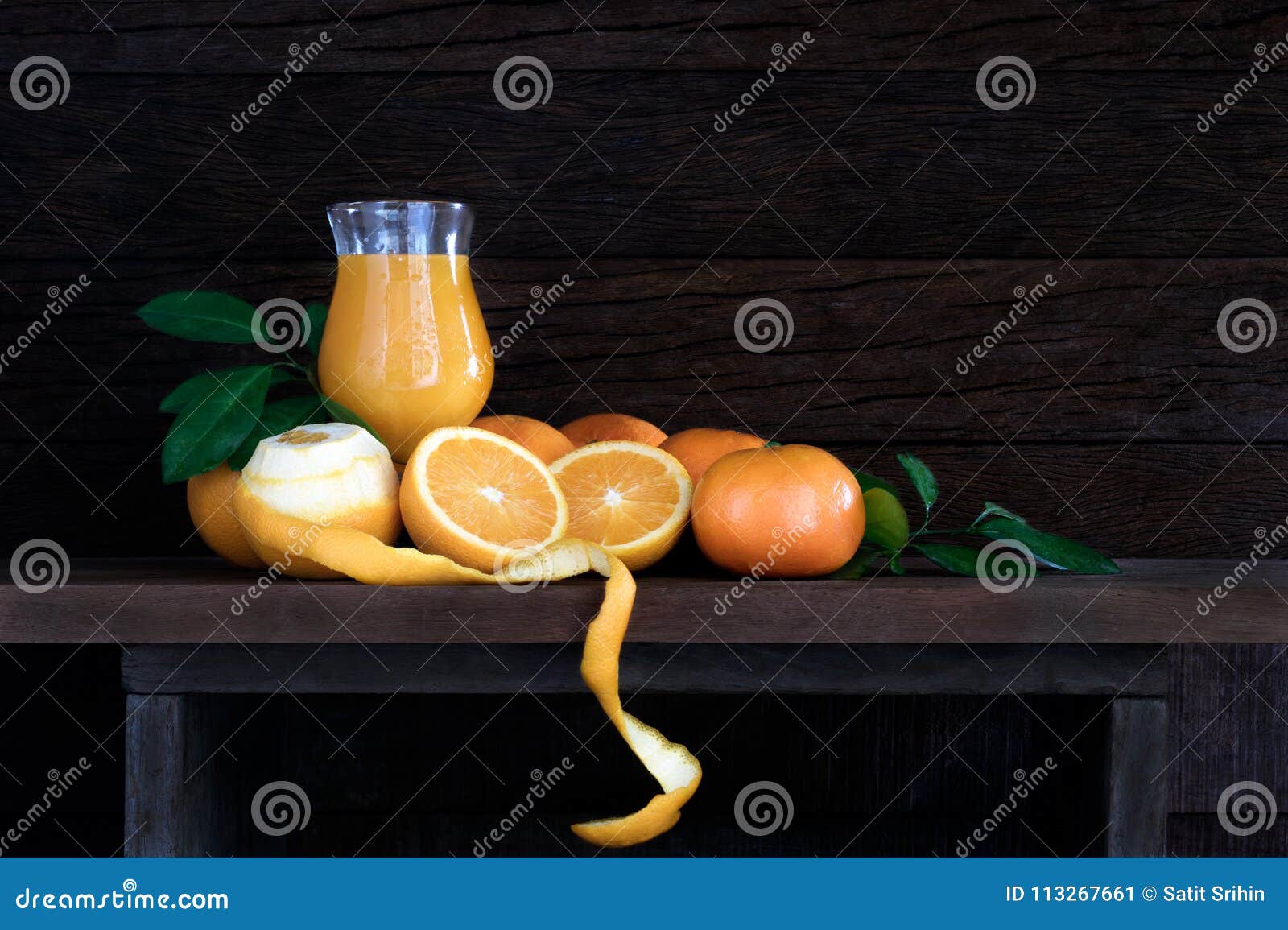 Orange Juice In A Glass Jar On The Kitchen Table Stock Photo, Picture and  Royalty Free Image. Image 12610775.