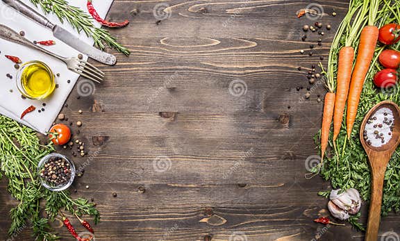 Fresh Organic Vegetables and Spoons on Rustic Wooden Background, Top ...