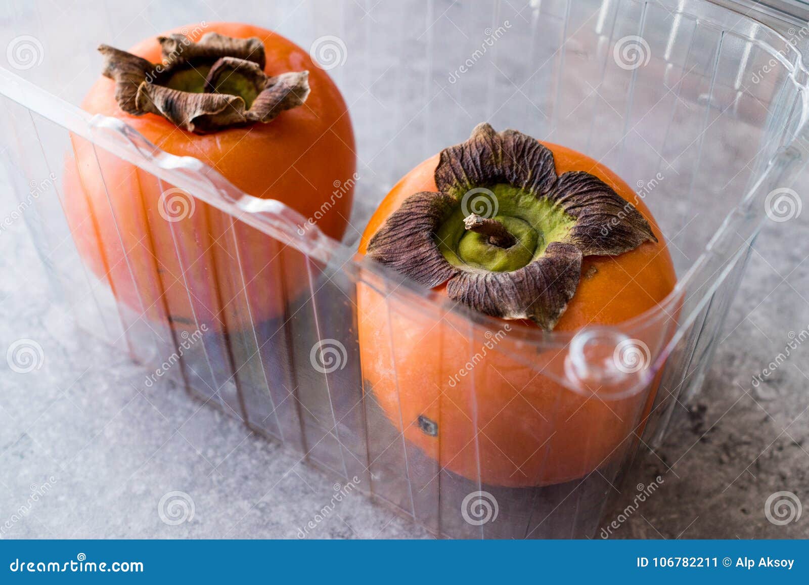 Fresh Persimmon Fruits in Plastic Box Stock Image - Image of fruit ...