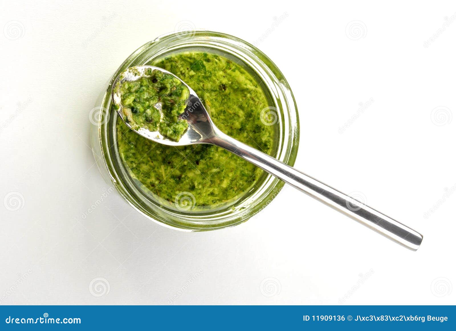 Fresh pesto with olive oil stock photo. Image of gastronomy 11909136