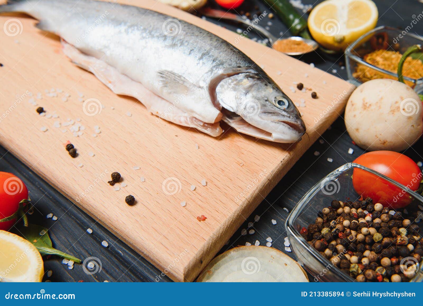 Fresh Rainbow Trout with Spices and Ingredient for Cooking Stock Photo