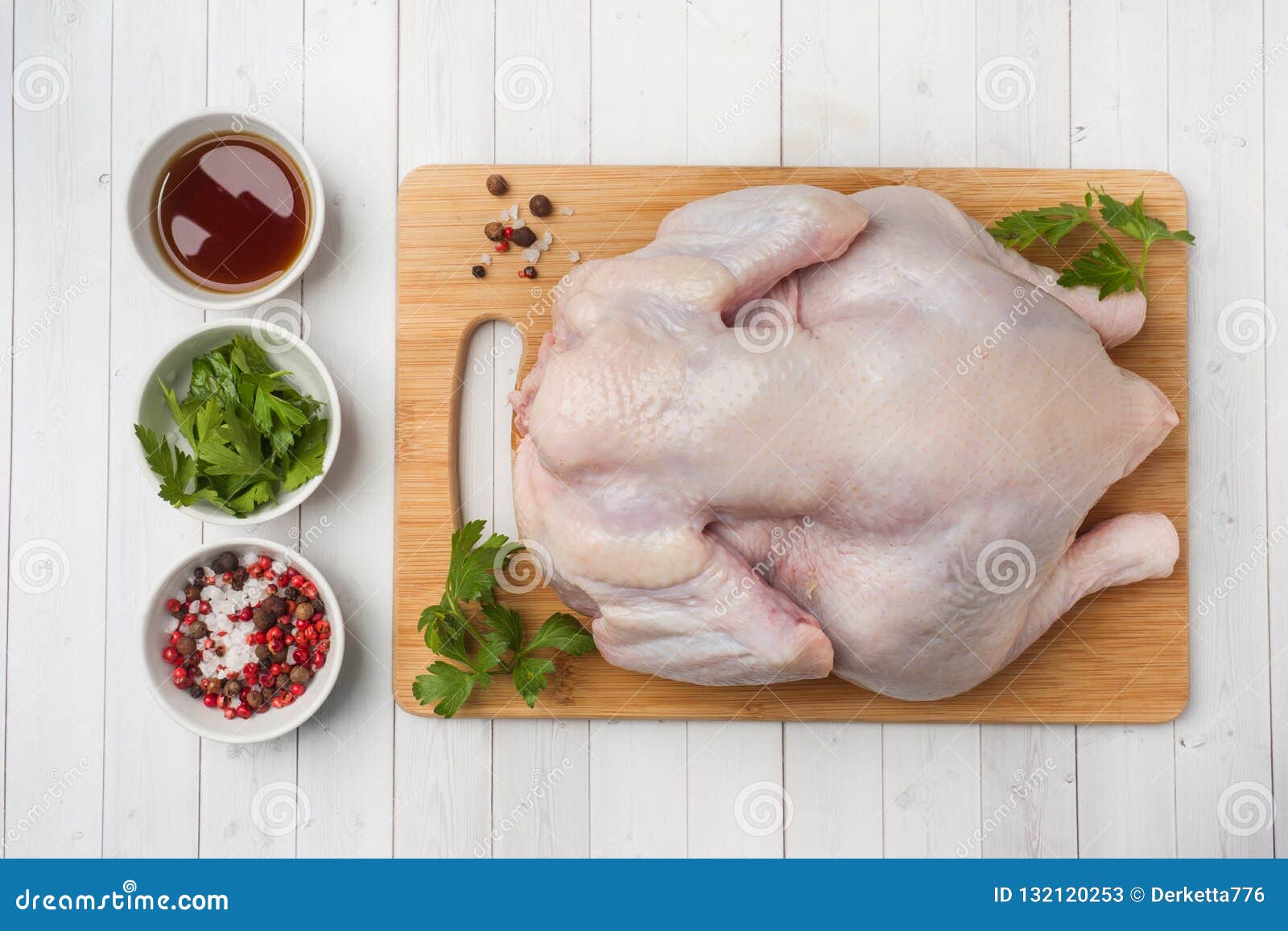 Fresh raw chicken on cutting board and spices for cooking Stock Photo by  ff-photo