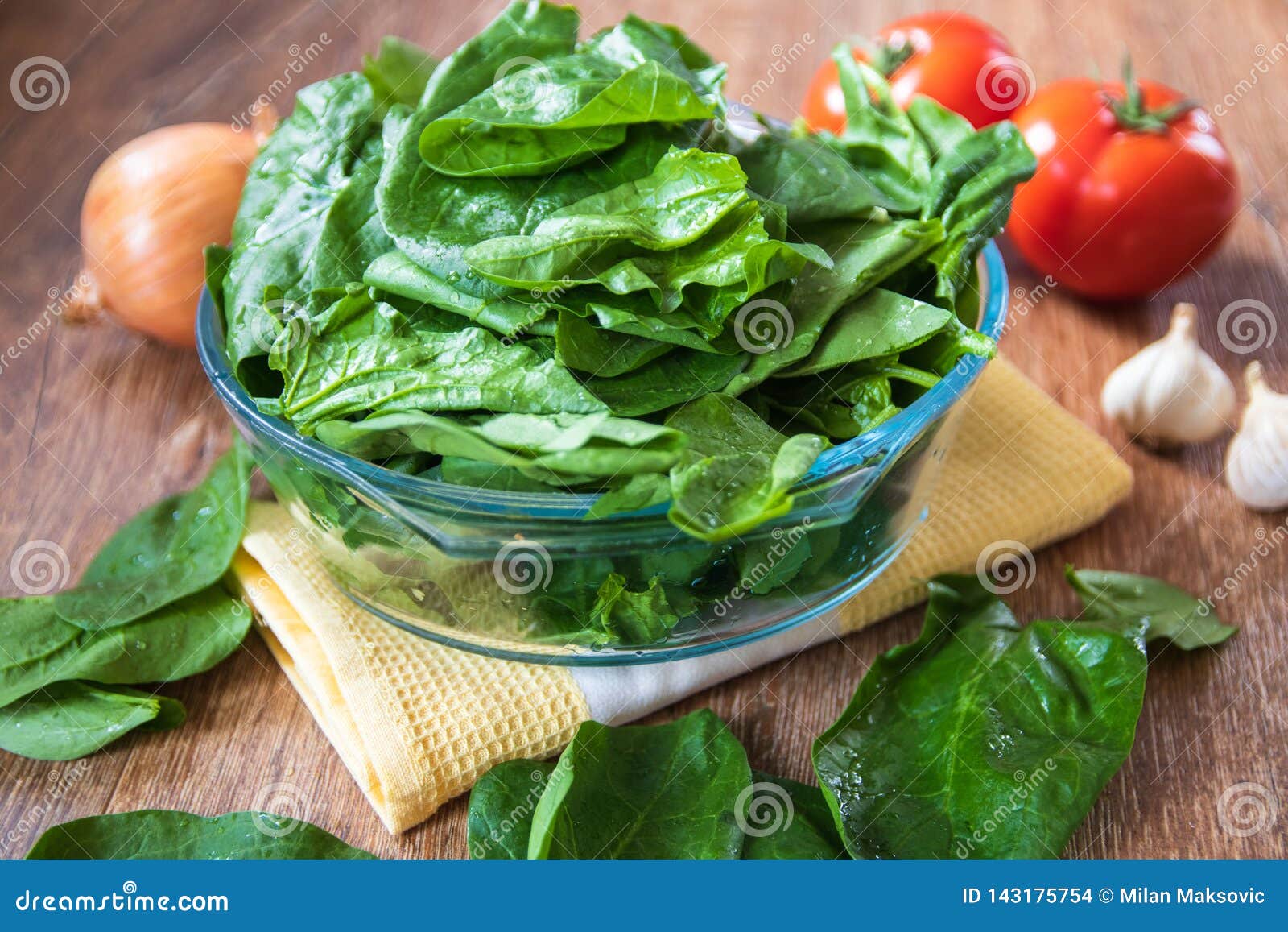 Fresh Raw Organic Spinach Leaves in a Glass Bowl Stock Photo - Image of