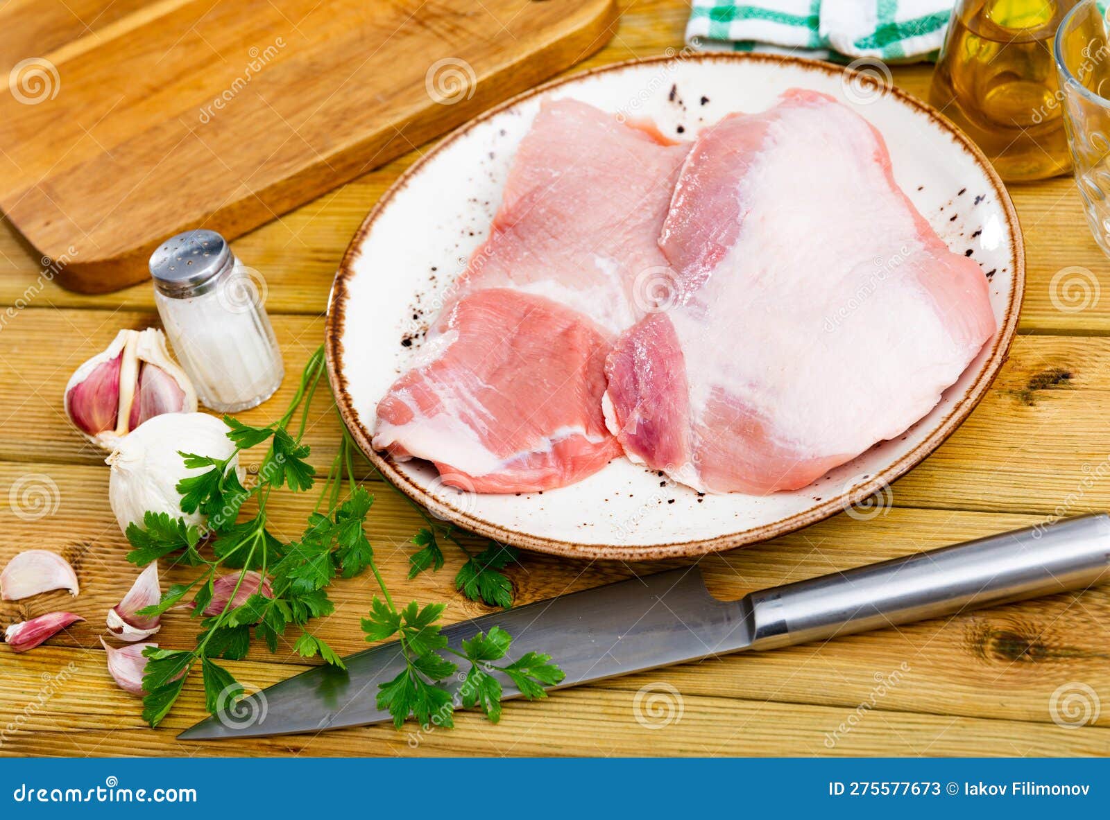 fresh raw pork secreto steak and spices prepared for cooking