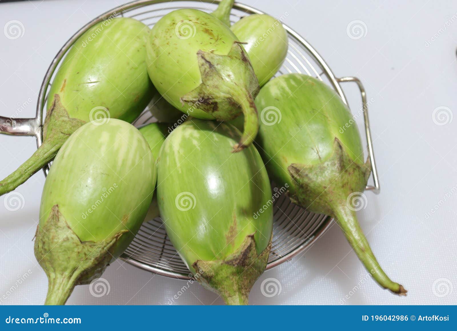 Fresh Raw Sliced Green Colour Eggplant Brinjal or Eggplant Isolated on  White Background Stock Photo - Image of natural, cooking: 196042986